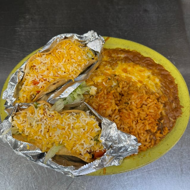 #16 Chicken, Beef, or Carnitas Tacos.
